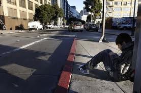 Homeless Boy on Street Corner
